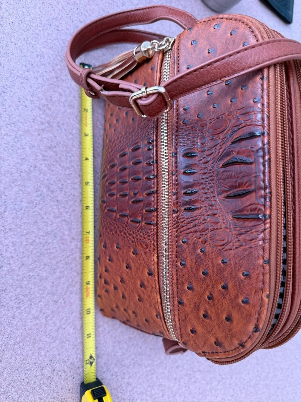 Women's Brown Crossbody Bag with Crock Print & Tassel Zip Pocket